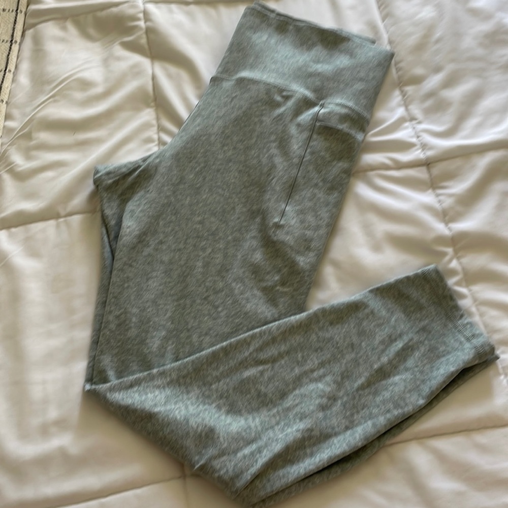 Athleta salutation stash pocket